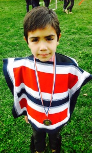 Proud of his second place medal!
